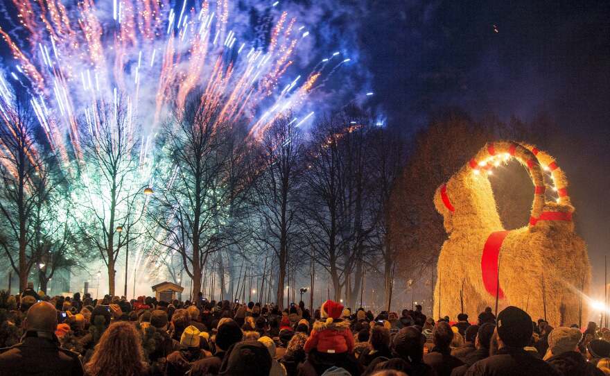 People look at fireworks during the inauguration of the traditional Gavle Goat on Nov. 29, 2015, in Gavle, Sweden.