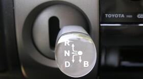 The gear shift in a Toyota Prius. Auto safety experts recommend shifting into neutral if a car begins accelerating out of control.
