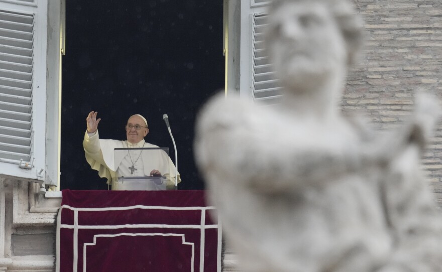 Pope Francis delivers the Angelus noon prayer in St.Peter's Square, at the Vatican on Sunday.