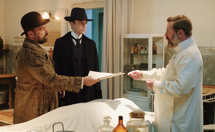 Psychoanalyst Max Liebermann (Matthew Beard, right) and Detective Inspector Oskar Rheinhardt (Juergen Maurer) investigate the mysterious death of a Hungarian countess in VIENNA BLOOD: Season 2.