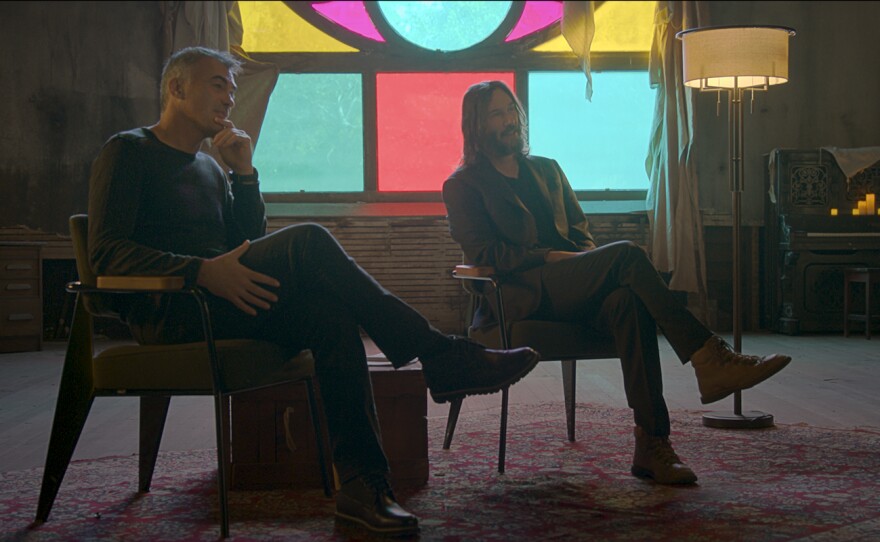 Chad Stahelski and Keanu Reeves in "Wick is Pain" documentary. (2025)