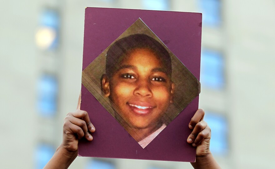 Protesters and members of the group Puncture The Silence rally against the shooting of 12-year-old Tamir Rice at Public Square on Nov. 24, 2014