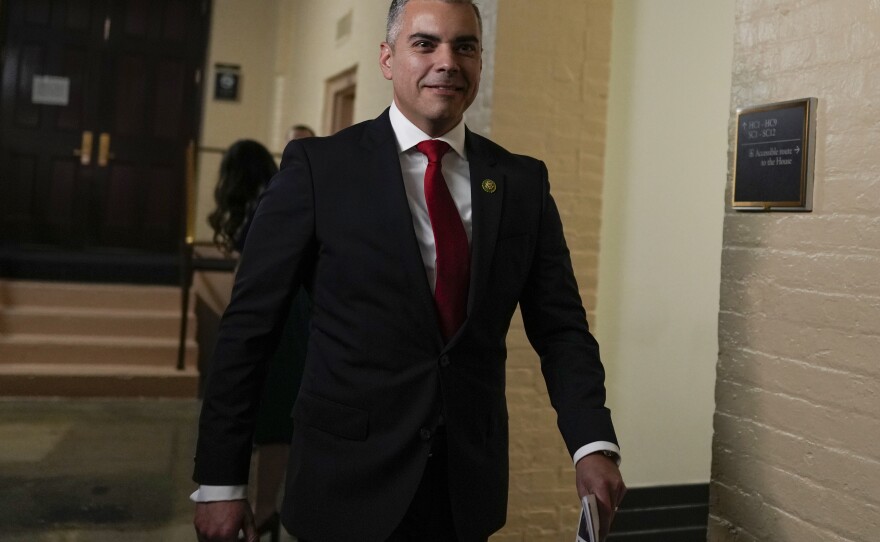 Rep. Juan Ciscomani, R-Ariz., walks past reporters on the opening day of the 118th Congress at the U.S. Capitol in Washington on Jan. 3.
