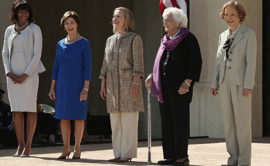 Then-first lady Michelle Obama and former first ladies Laura Bush, Hillary Clinton, Barbara Bush and Rosalynn Carter attend the opening ceremony of the George W. Bush Presidential Center on April 25, 2013, in Dallas.