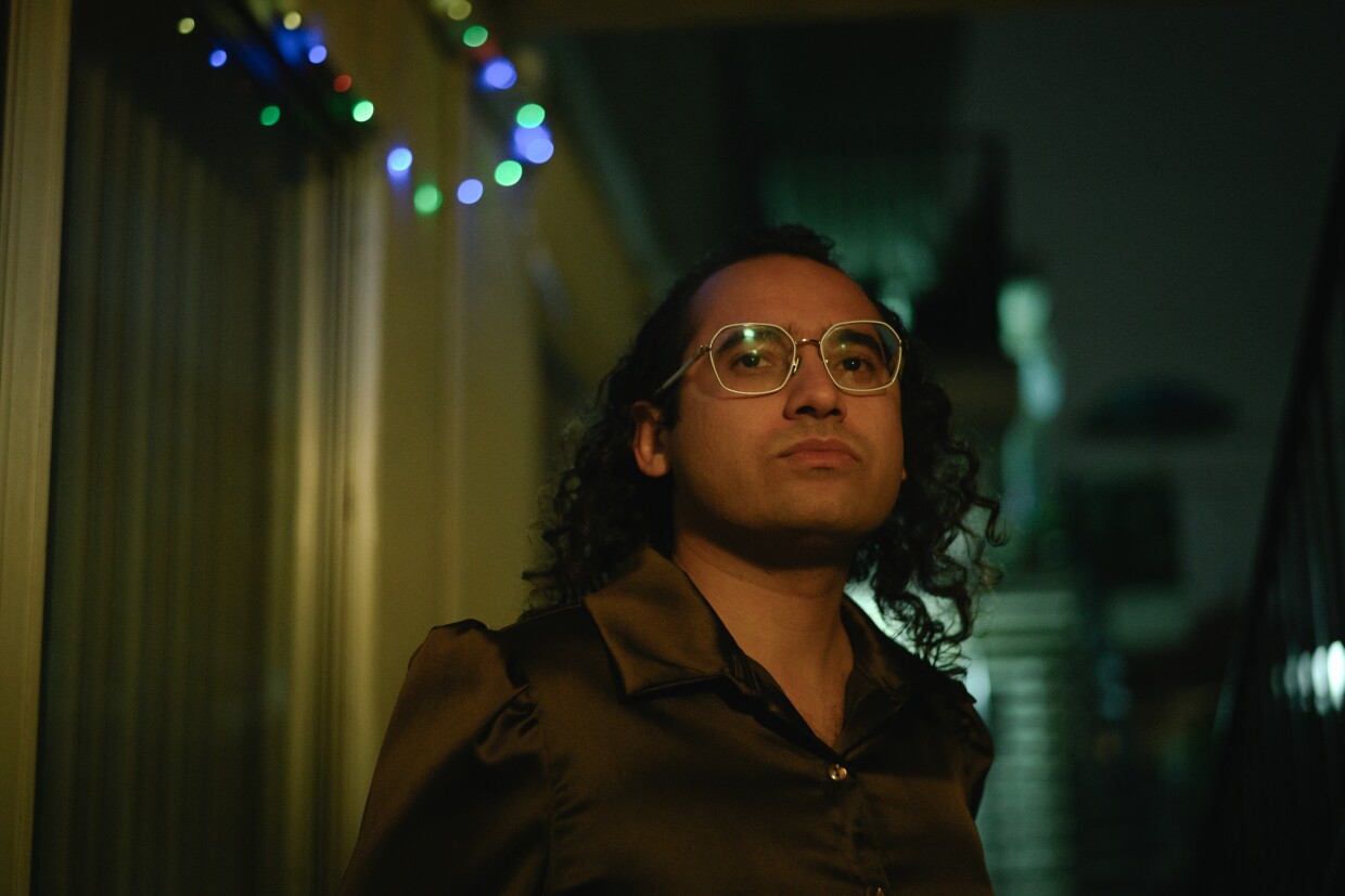 Raul Ureña, former mayor of Calexico and an advocate for Imperial County’s transgender community, stands for a portrait outside their home in San Diego, California on February 5, 2025. Ureña has been an outspoken critic of the Imperial Valley LGBT Center’s effort to rebrand itself as the Donnelly Center.