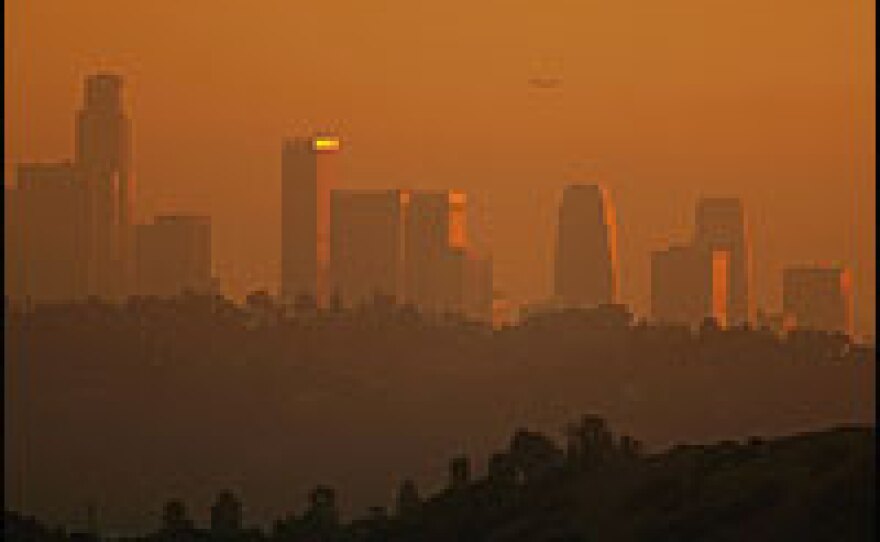 The downtown skyline of Los Angeles, enveloped in smog in 2006.  Los Angeles is the second smoggiest city in the U.S, according to a new study in the <em>New England Journal of Medicine.</em>