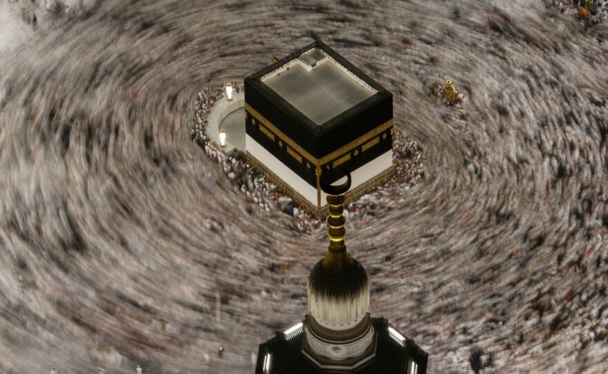 This photograph made with a slow shutter speed shows Muslim pilgrims circumambulating the Kaaba, Islam's holiest site at the Grand Mosque during the annual Hajj pilgrimage in Mecca, Saudi Arabia, Sunday, May 24, 2026.