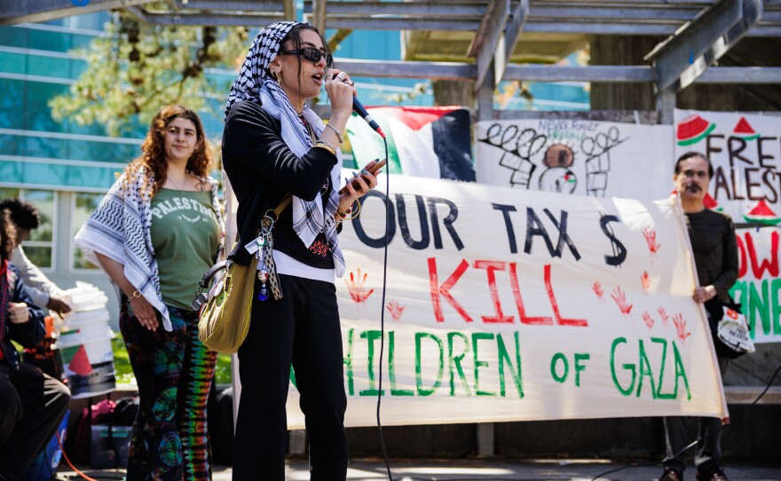 San Francisco State University student Zinaib I. speaks at a rally outside the Cesar Chavez Student Center at SFSU on April 30.