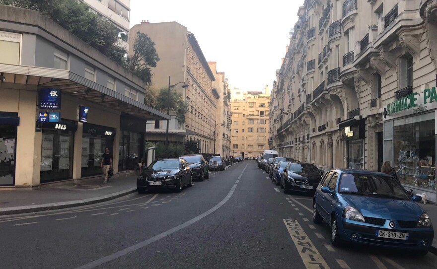 A street in Paris' 16th arrondissement is deserted in the middle of the day in August.