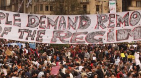 Protestors gather in Tahrir Square on February 1, 2011 in Cairo, Egypt. Protests in Egypt continued with the largest gathering yet, with many tens of thousands assembling in central Cairo, demanding the ouster of Egyptian President Hosni Mubarek. The Egyptian army has said it will not fire on protestors as they gather in large numbers in central Cairo. (Photo by Peter Macdiarmid/Getty Images) 