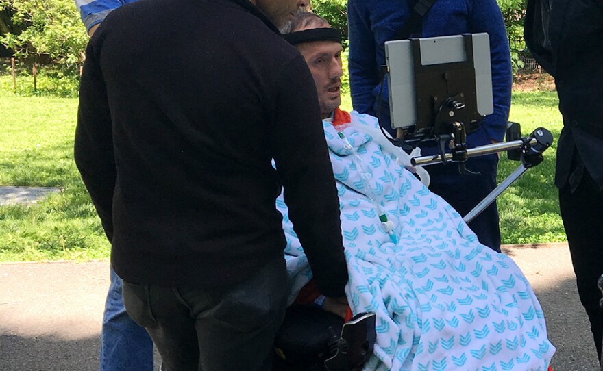 Family members surround Adox on the day that he died last May. His wish to die in a hospital so that he could donate his organs turned out to be difficult to fulfill.