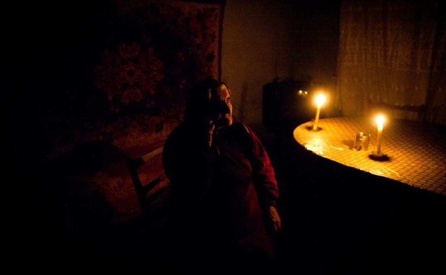 Yepraksia Gevorgyan, 108, sits at night in her home in Armavir, Armenia.