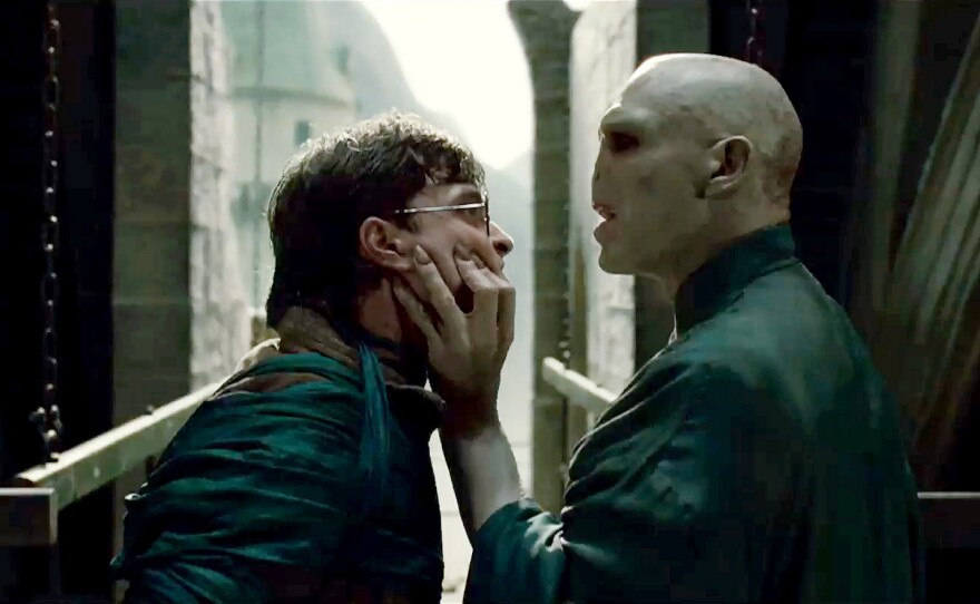 Daniel Radcliffe and Ralph Fiennes face off as Harry Potter and lord Voldemort.