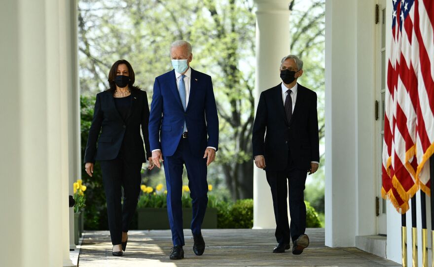 President Joe Biden, Vice President Harris and Attorney General Merrick Garland arrive at the White House Rose Garden to speak about gun violence prevention on Thursday.