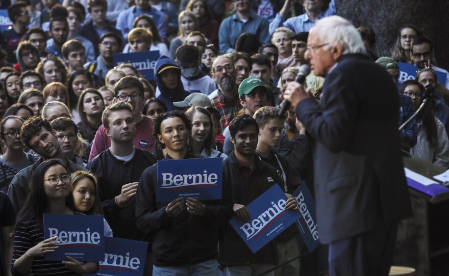 Students listen, as presidential candidate Bernie Sanders speaks at Dartmouth College in Hanover, N.H.