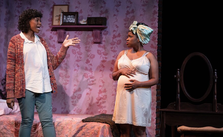 Actors portray two sisters on stage at Cygnet Theater