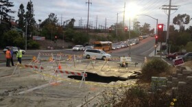 A water main break created a sinkhole in Oceanside, Oct. 16, 2014.