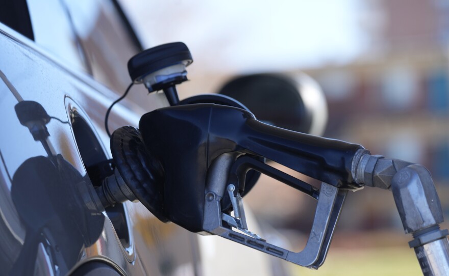 A motorist fills a vehicle with gasoline at a Shell station on Nov. 5 in Denver. Energy prices are among the biggest drivers of inflation.