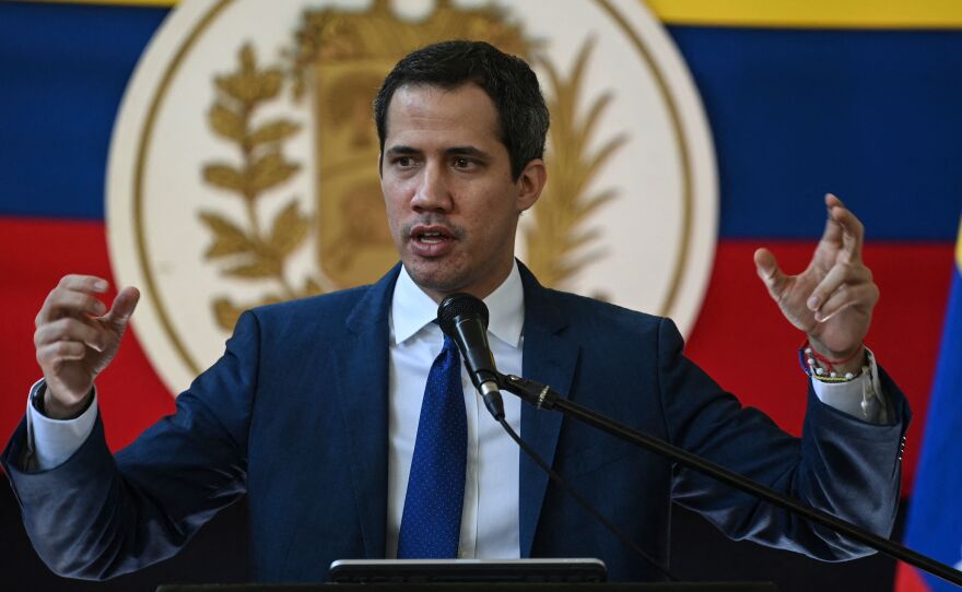 Venezuelan opposition leader Juan Guaidó gestures while speaking during a news conference at the Morichal Park the day after regional and municipal elections, in Caracas, on Nov. 22.