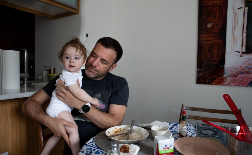 Cenk Bulbul, a single dad by choice, with his youngest daughter Gaia Bulbul in New York, NY. Cenk had both his daughters via the same surrogate using donor eggs and his sperm to make the embryos that were implanted.