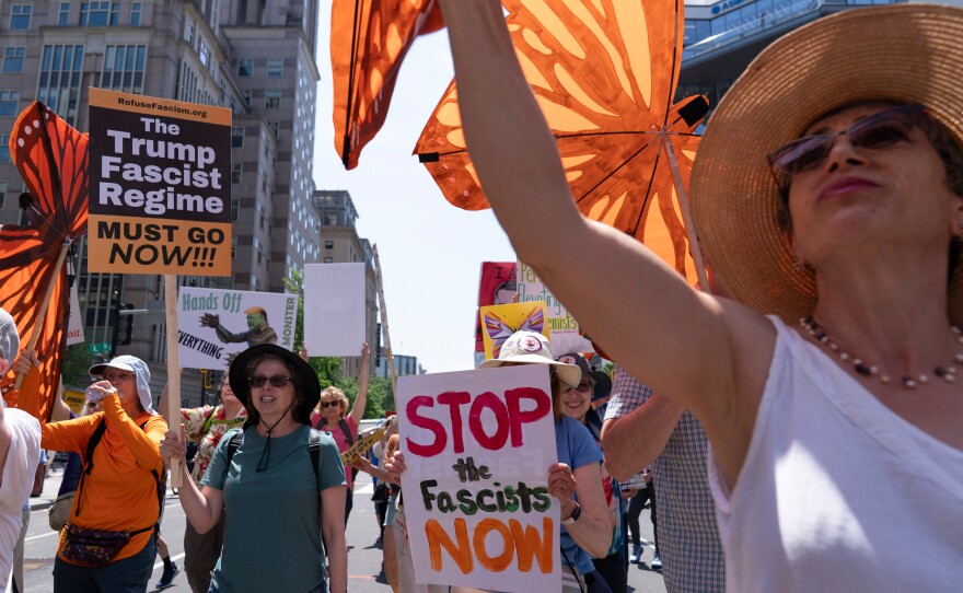 Demonstrators march to the White House during a May Day protest in Washington, D.C., on May 1, 2025.