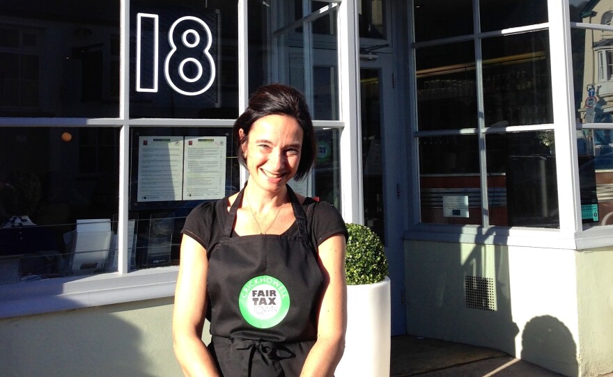 Samantha Devoss, the proprietor of Crickhowell's Number 18 coffee shop, helped organize the town's offshore tax scheme. If more towns did something similar, the government would be forced to close loopholes used by big corporations, she believes.