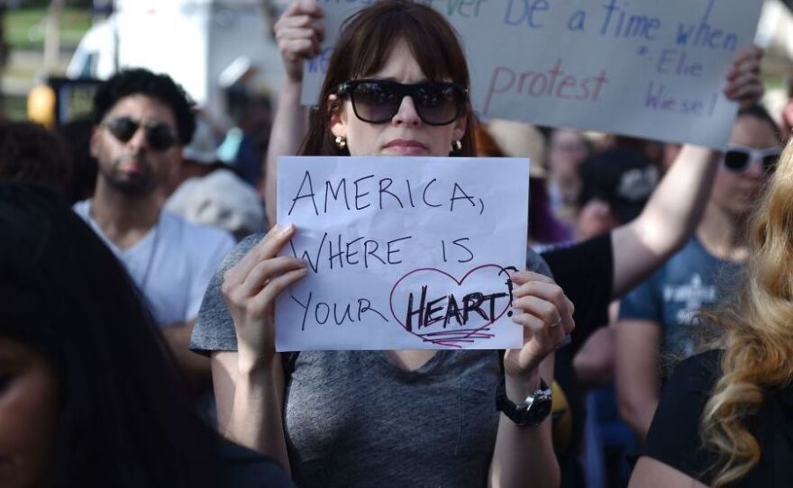 Critics of U.S. government policy that separates children from their parents when they cross the border illegally from Mexico protest in downtown LA on June 14.