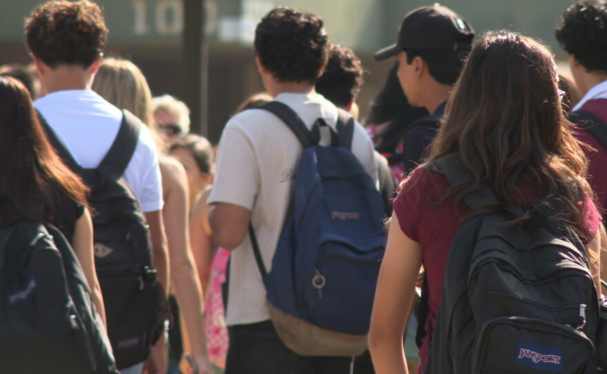Students walk into Patrick Henry High School on San Diego Unified's first day of school on Monday, Aug. 10, 2026.
