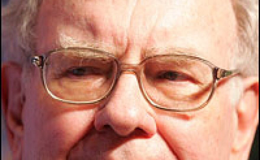 Billionaire financier Warren Buffett looks on during a fundraising event for U.S. Democratic presidential candidate Sen. Hillary Clinton (N.Y.) June 26, 2007 in New York City.