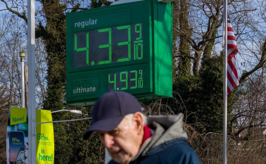 A sign shows the price of gas outside of a gas station in Washington, D.C, on March 8. Annual inflation is likely to have hit another 40-year high in February, yet the data won't fully capture the most recent surge in energy prices after Russia invaded Ukraine.