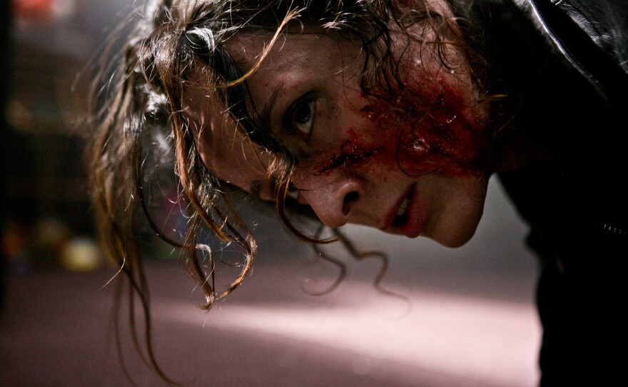 Claude Perron is a tough female cop who takes on a female zombie in a new twist on cat fights in "La Horde"