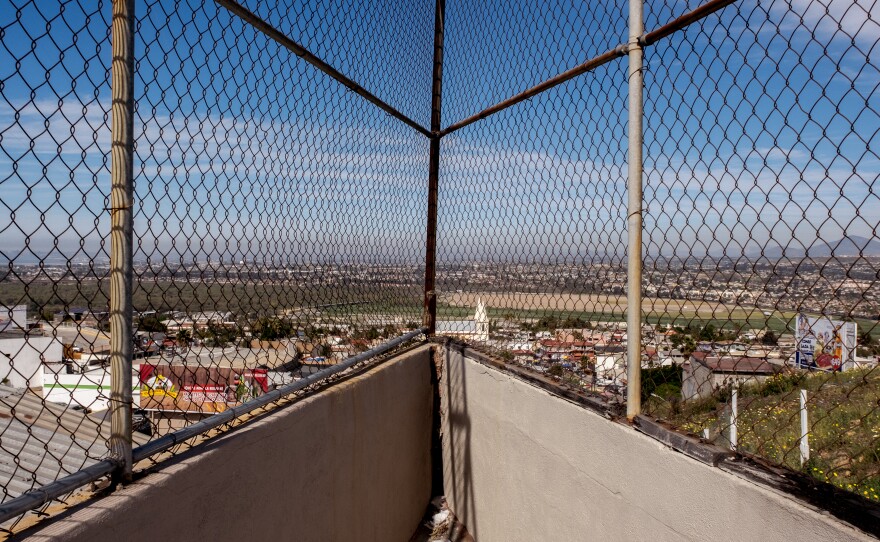 The view of the border and San Diego from the public area of a Tijuana apartment building managed by real estate agent Gustavo Chacon Aubanel,  March 2, 2022.