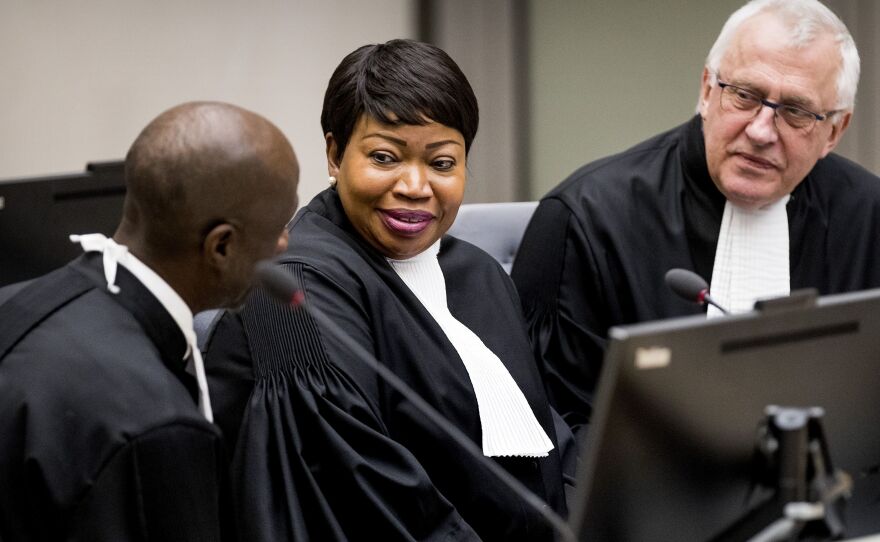 The office of International Criminal Court prosecutor Fatou Bensouda (center) says her visa for U.S. travel has been stripped. The State Department confirmed the move Friday.