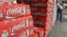 A shopper buys Coca-Cola at Costco in Mountain View, Calif., in April. Costco, which pulled Coke from its shelves this month, has also removed other products when it got into a dispute with the manufacturer over price.