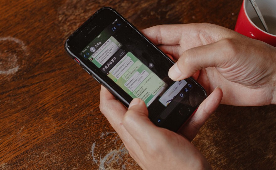 Gao shows a string of text messages between him and his onetime friend, Wang Jingyu. One message from Wang reads, "Look at how bad the Communist bandits are."