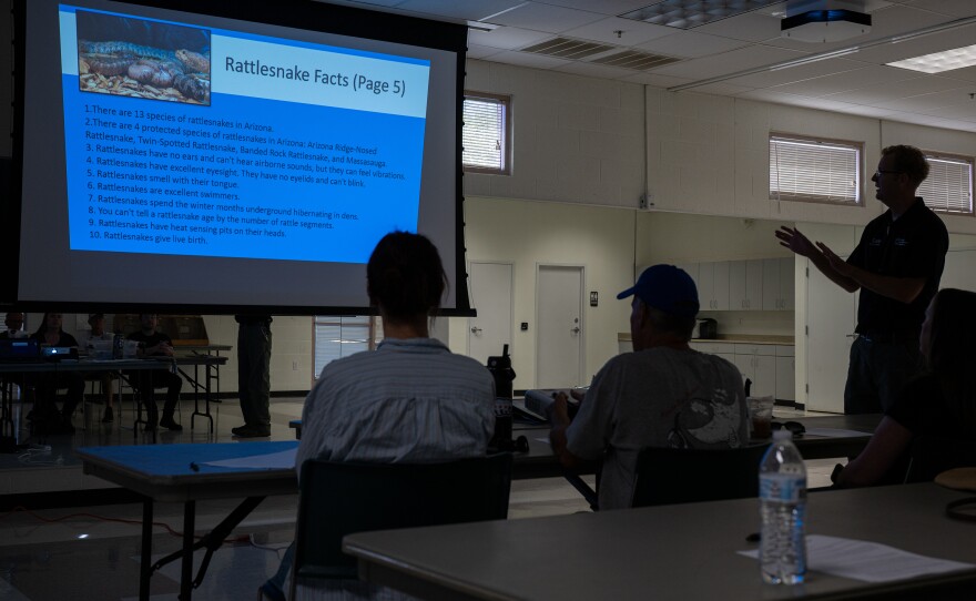 Cale Morris of the Phoenix Herpetological Society leads a class on rattlesnakes.