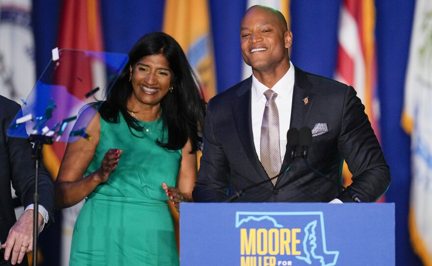 Democrats Aruna Miller (left) and Wes Moore react during an election night gathering after Miller was declared the winner in the race for the Maryland lieutenant governor and Moore was declared the winner in the gubernatorial race in Baltimore.