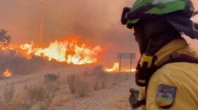 This image made from video provided by INFOCA shows firefighters battling a wildfire near Los Gallardos, Almeria, Spain, on Thursday, July 9, 2026.