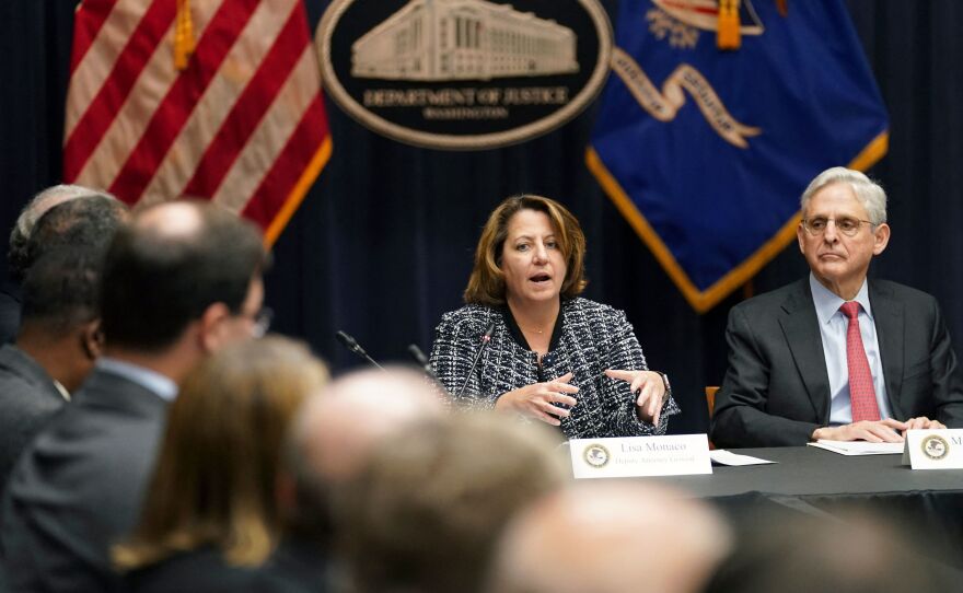 US Attorney General Merrick Garland and Deputy US Attorney General Lisa Monaco  in Washington, DC, March 10, 2022. Monaco signed a memo ending the use of compassionate release waivers in plea agreements.