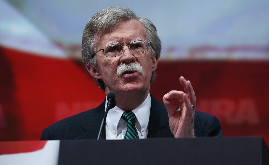 Former U.S. ambassador to the U.N. John Bolton speaks during the 2013 NRA Annual Meeting in Houston, the same year he recorded a promotional video for a Russian gun rights group with ties to the NRA.