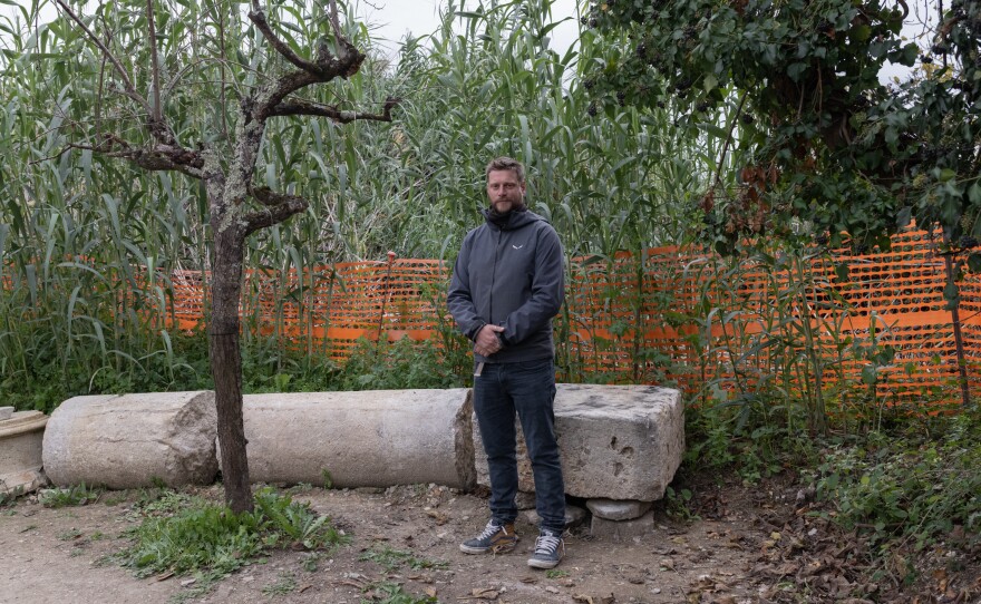Ludovico Salerno, vice president of the San Casciano dei Bagni Archaeological Association, at the archaeological site on Nov. 12. "Sick people came to the sanctuary in the hopes of being cured and would offer gifts to the gods," he says. "It was a place of suffering, and it was a place of hope."