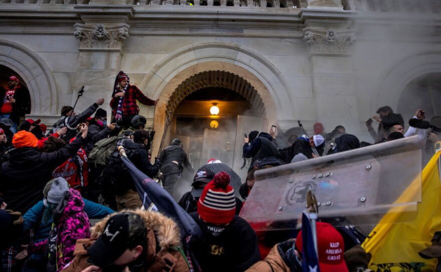 Trump supporters clash with police and security forces as people try to storm the U.S. Capitol on Jan. 6.