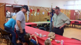San Diego Mayor Bob Filner talks with kids and parents eating lunch at the Tierrasanta Recreation Center, Dec. 19, 2012.