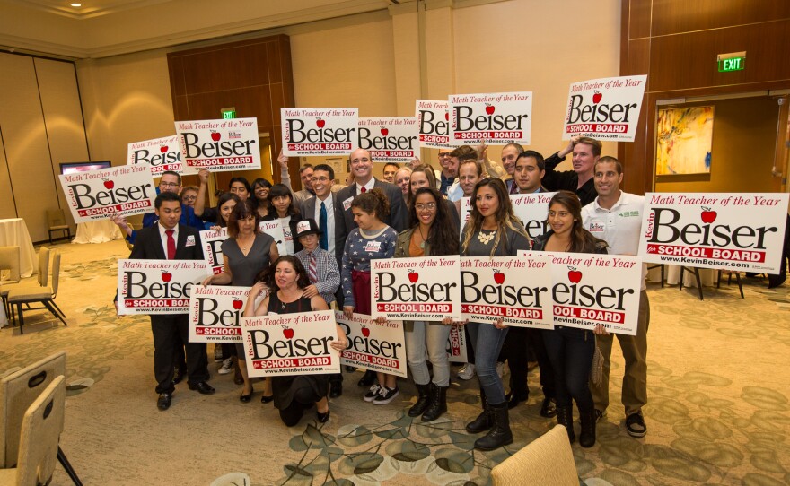 Kevin Beiser, President, San Diego Unified School Board poses with supporters at Westin Hotel, downtown San Diego, on election night, November 4, 2014.