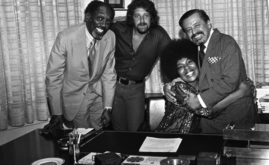 Flack (seated) with (from left) John Levy, Joel Dorn and Atlantic Records executive Nesuhi Ertegun in 1970.