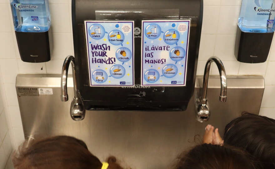 Signs list the steps for washing hands in English and Spanish at a Head Start program in Vista on Wednesday, Sept. 16, 2026.