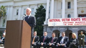 Gov. Jerry Brown speaks at a rally for crime victims and their families at the State Capitol Monday. 