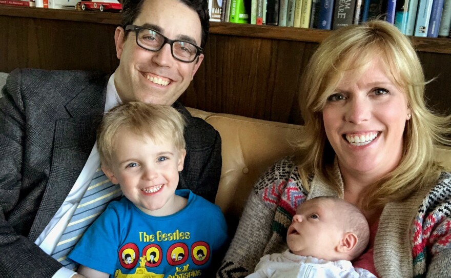 Allison Matthews, holding her infant daughter, Lottie, took part in the Mayo Clinic's program to reduce prenatal visits for some women. During her pregnancy, Matthews monitored her weight and tracked her blood pressure and fetal heart rate at home. That allowed her husband, Marc, and son, Gus, to hear the heartbeat. (Courtesy of Allison Matthews)