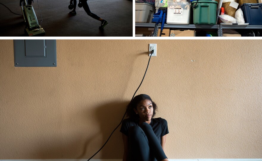 (Top left) Vashti Cunningham does lunges as her father vacuums in the garage, which functions as a training room at the Cunninghams' home in Las Vegas. (Top right) A poster of Vashti peeks over storage boxes in the garage at the Cunninghams' home. (Bottom) Vashti stretches as she begins a workout with her father.
