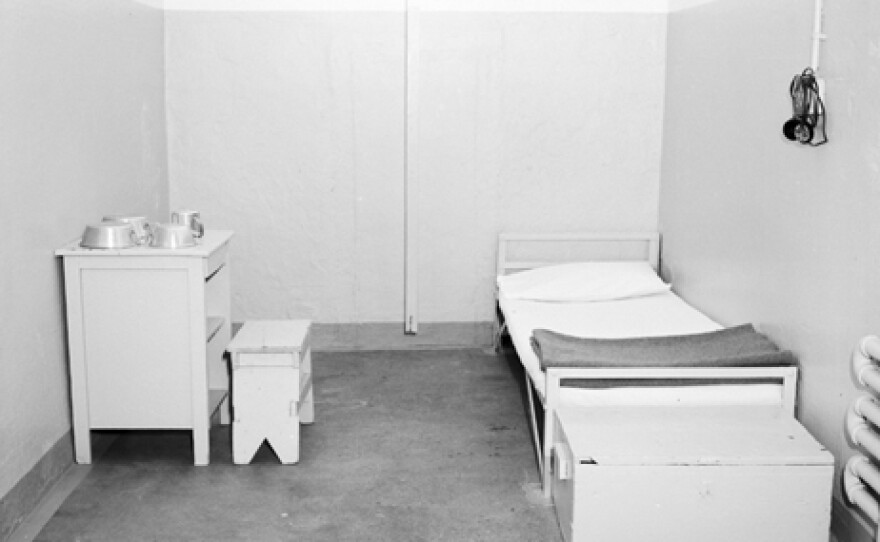 An archival image from 1950 of the interior of a cell used for solitary confinement at Eastern State Penitentiary.